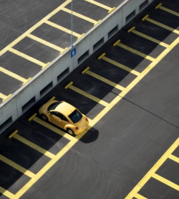 yellow car in parking lot | 13 Advantages of Shift Work for Employees