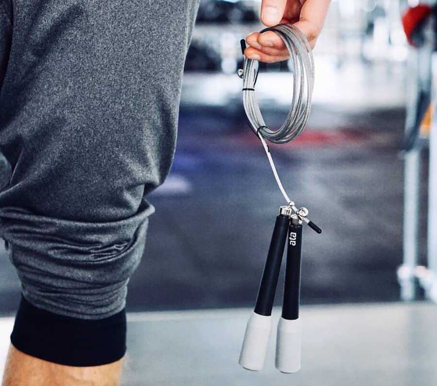 Skipping jump rope being help in gym