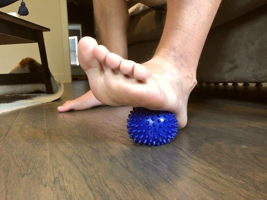 How to Relieve Foot and Leg Pain from Standing All Day in 6 Simple Steps - Dans foot with blue spikey ball-min