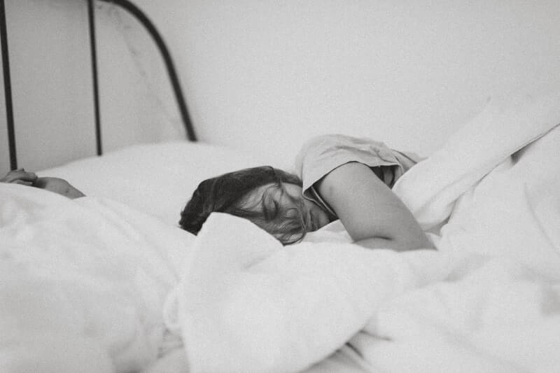 black and white. Girl sleeping in bed white sheets | How Can I Sleep Without My Boyfriend?
