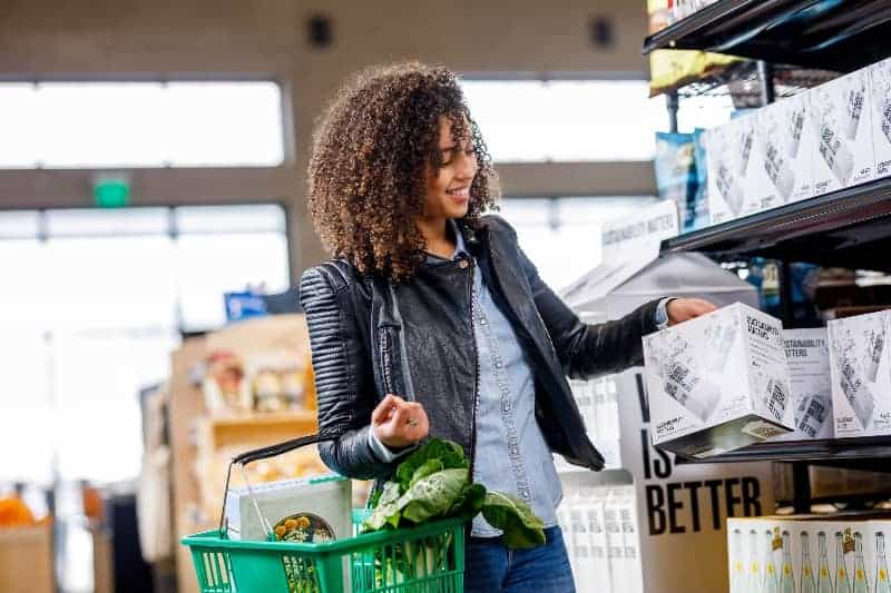 Lady holding grocery basket