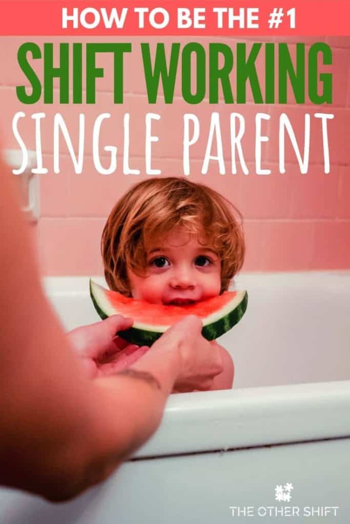 Young boy sitting in the bath being fed watermelon