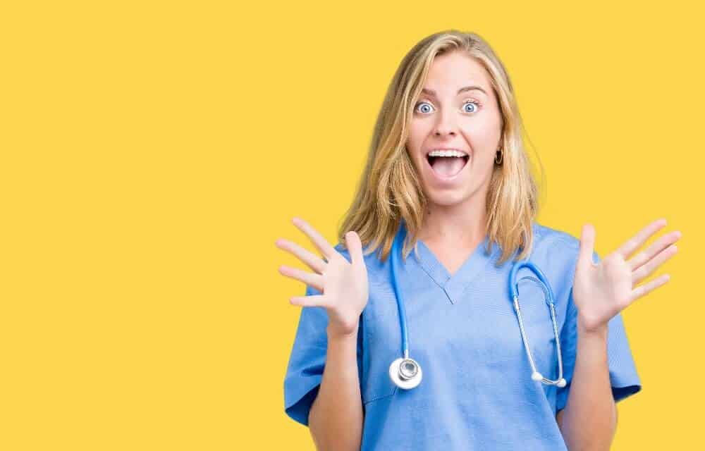 Nurse wearing scrubs smiling | Nurse Survival Kit | The Other Shift
