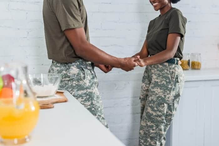 two people dressed in army clothing