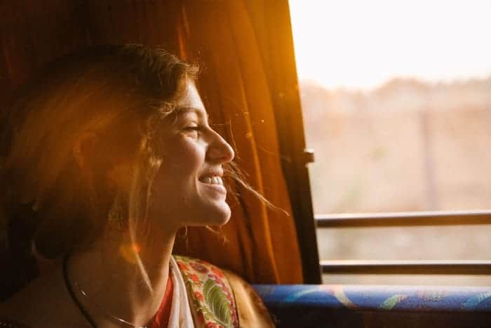 women smiling with sun on face